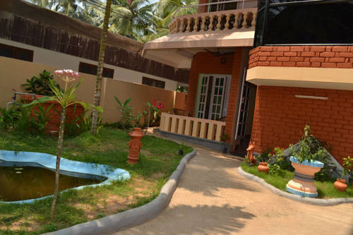 Cosmic Leisure Resort โกวาลัม ภายนอก รูปภาพ